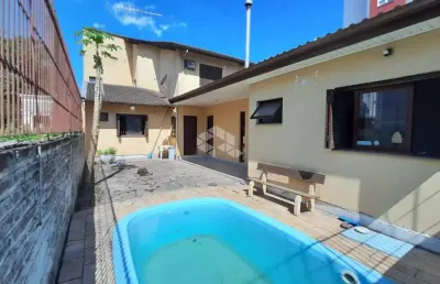 Casa ampla 4 dormitórios, suíte, 4 banheiros, piscina, 4 vagas, bairro operário, novo hamburgo. aceita financiamento e fgts.
