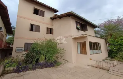 Casa  bairro operario com 5 dormitorios 3 suites 2 vagas de garagem e churrasqueira