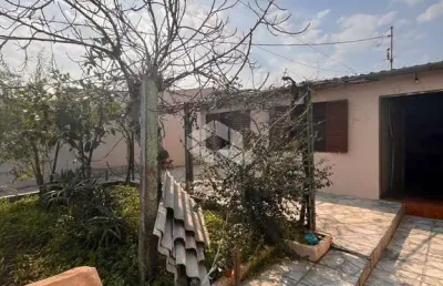Casa com 3 quartos à venda na Trinta E Quatro, 6, Guajuviras, Canoas