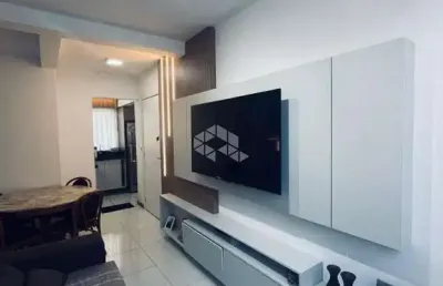 Apartamento dois dormitórios com sacada e suíte semi mobiliado