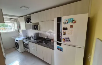 Apartamento de 2 dormitórios sendo 1 suíte no bairro marechal rondon em canoas rs