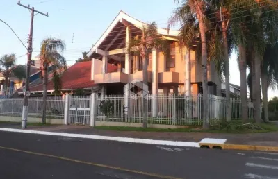 Casa/sobrado com 4 suítes, de esquina no bairro marechal rondon/canoas-rs.