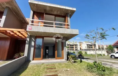 Sobrado de alto padrão em capão novo - a 50m da praia!