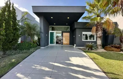 Casa beira lago, com 200 m², constituído por 04 suítes, finamente  mobiliada e decorada,  capão da canoa.