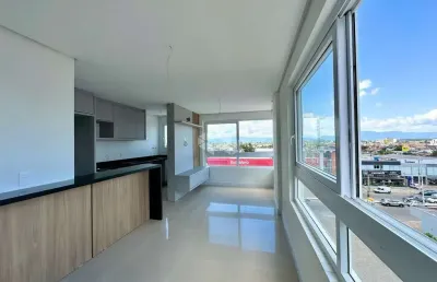 Apartamento composto por 3 suítes,  semi mobiliado,  01 box  para carro. na zona nobre de capão da canoa