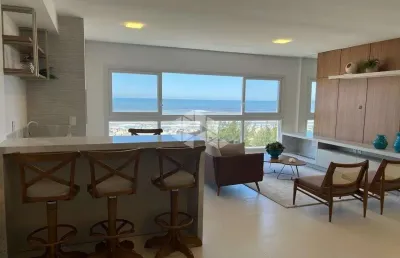 Apartamento 04 quartos/suítes, beira-mar, mobiliado e decorado, em capão da canoa/rs.