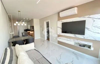 Apartamento com 2 dormitórios/quartos e 1box/vaga no bairro navegantes em capão da canoa/rs