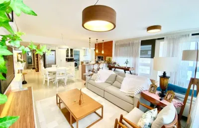 Apartamento à venda no bairro navegantes, capão da canoa com 4 quartos (3 suítes), vista para o mar e serra.