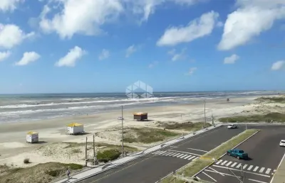 Apartamento de 2 dormitórios na beira mar, praia capão da canoa
