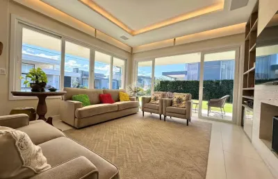 Casa térrea  com 04 suítes no condominio dubai em capão