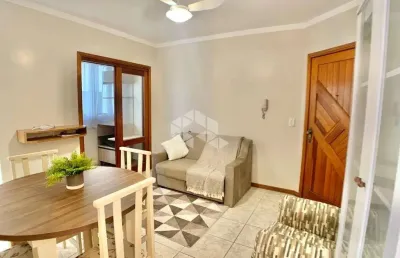 Apartamento de 2 dormitórios, mobiliado e decorado, lavabo, em capão da canoa