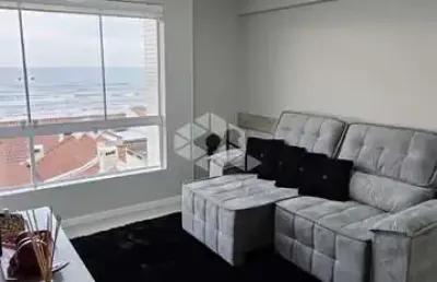 Apartamento 02 dormitórios (sendo 01 suíte) uma quadra do mar em capão da canoa