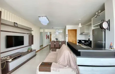 Apartamento à venda no centro de capão da canoa com 2 quartos (1 suíte), mobiliado, ventilado com 2 vagas e a  apenas 2 quadras do mar