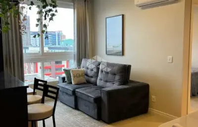 Apartamento novo com 02 dormitórios(sendo 01 suíte),mobiliado, em capão da canoa/rs.
