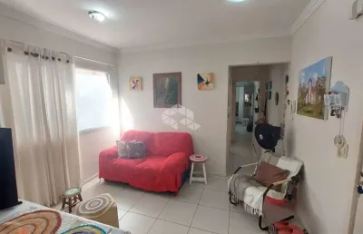Apartamento à venda em capão da canoa, 2 dormitórios, 1 suíte, vaga de garagem e excelente localização