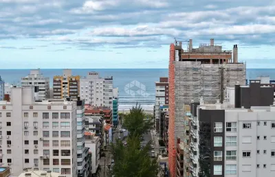 Dois dormitórios no centro de capão com vista mar mobiliado