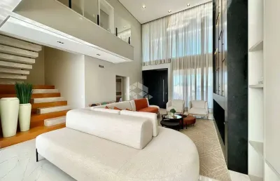 Belíssimo sobrado com 343 m² privativos, 04 suítes ( 01 térrea ) , 02 vagas/box, no condomínio ilhas resort, capão da canoa/rs