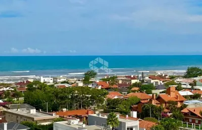 Apartamento com  03 suítes, lavabo, sacada de frente integrada, vista definida para o mar, infraestrutura, capão da canoa