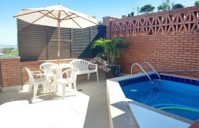 Casa em condomínio fechado com 3 quartos à venda na Avenida Jacuí, 978, Cristal, Porto Alegre