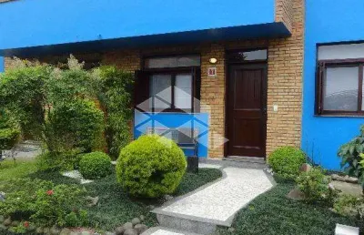 Casa em condomínio fechado com 3 quartos à venda na Avenida Vicente Monteggia, 2212, Cavalhada, Porto Alegre