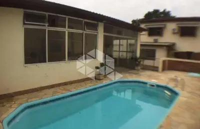 Casa com 4 quartos à venda na Rua Cangussu, 612, Nonoai, Porto Alegre
