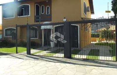 Casa com 3 quartos à venda na Rua Inhanduí, 340, Cristal, Porto Alegre