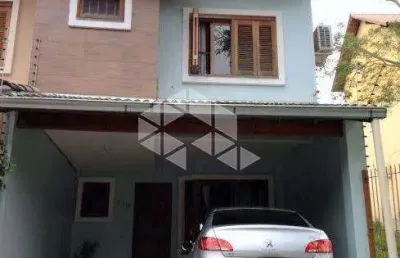 Casa em condomínio fechado com 3 quartos à venda na Avenida Doutor Francisco Roberto Dall Igna, 180, Espírito Santo, Porto Alegre