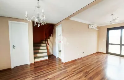 Excelente casa em condomínio à venda, com 2 dormitórios e 1 vaga de garagem, no bairro camaquâ