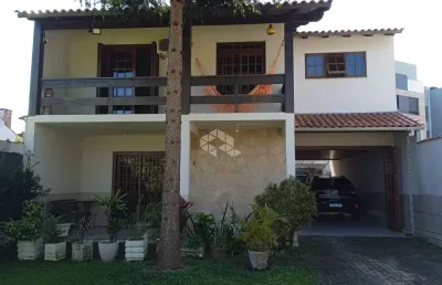 Casa com 3 quartos à venda na Avenida Coronel Marcos, 2124, Ipanema, Porto Alegre