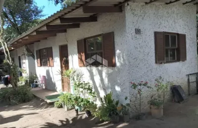 Duas casas em terreno com 600m2 próx. á praia de lami em porto alegre/rs