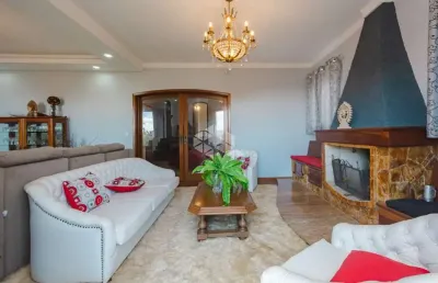 Casa com 4 quartos à venda na Rua Fernando Osório, 275, Teresópolis, Porto Alegre