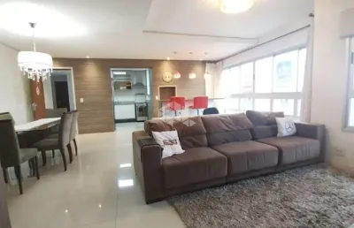 Magnífico apartamento de três dormitórios com suíte e duas vagas de garagem