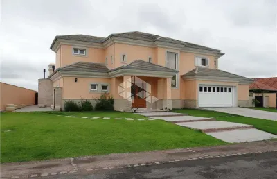 Casa em condomínio com 4 quartos, sendo 4 suítes, 506m², 4 vagas no bairro terra ville porto alegre