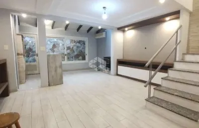 Bela casa em condomínio com três quartos sendo duas suítes