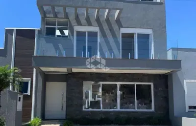 Casa em condomínio fechado com 4 quartos à venda na Rua Eroni Soares Machado, 300, Hípica, Porto Alegre