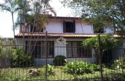 Casa com 4 quartos à venda na Rua Manoel Leão, 45, Pedra Redonda, Porto Alegre