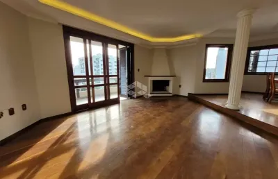 Apartamento semimobiliado central com 04 dormitórios, 02 vagas em caxias do sul