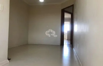 Apartamento semimobiliado 02 dormitórios no bairro charqueadas em caxias do sul