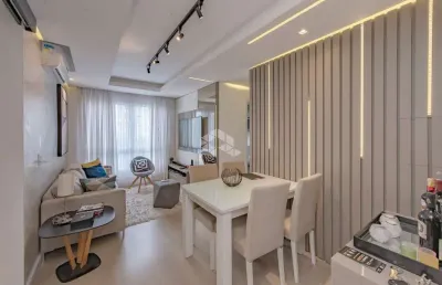 Apartamento de dois dormitórios com vaga de garagem no bairro partenon.