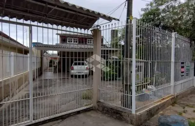 Casa a venda no centro de canoas c/3 quartos. 2 banheiros
