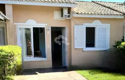 Casa dois dormitórios em condomínio rio branco canoas