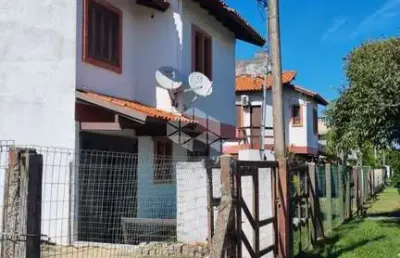 Casa sobrado  2 dormitórios  condomínio fechado para venda na praia imbé.