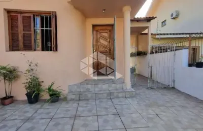 Casa de 2 dormitórios para venda com edícula, 2 vagas de garagem  no bairro santo antônio em porto alegre rs