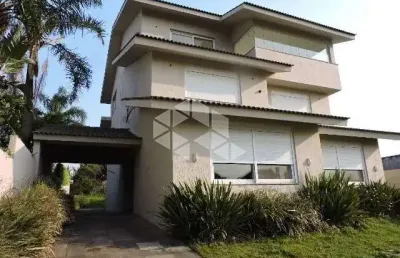 Casa em condomínio fechado com 5 quartos à venda na Rua General Salvador Pinheiro, 157, Vila Jardim, Porto Alegre