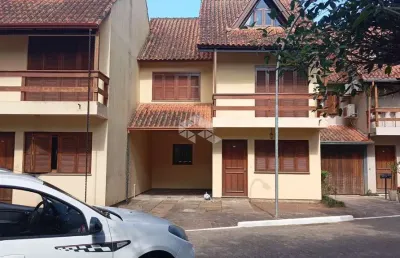 Casa em condomínio fechado com 3 quartos à venda na Avenida Orleaes, 105, Guarujá, Porto Alegre