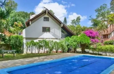 Casa sobrado no condomínio santa mônica em ipanema de 5 dormitórios.