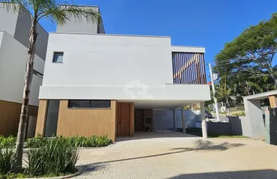 Casa em condomínio fechado com 3 quartos à venda na Rodovia Haroldo Soares Glavan, 1408, Cacupé, Florianópolis