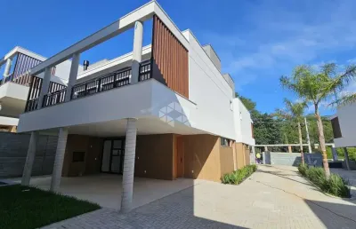 Casa residencial em condomínio fechado no bairro cacupé, florianópolis-sc