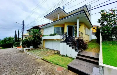 Casa 3 dormitórios em condomínio fechado em coqueiros