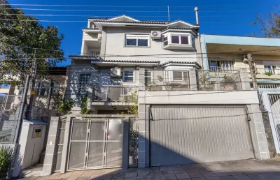 Casa com 4 quartos à venda na Bortolo Barbieri, 67, Jardim São Pedro, Porto Alegre